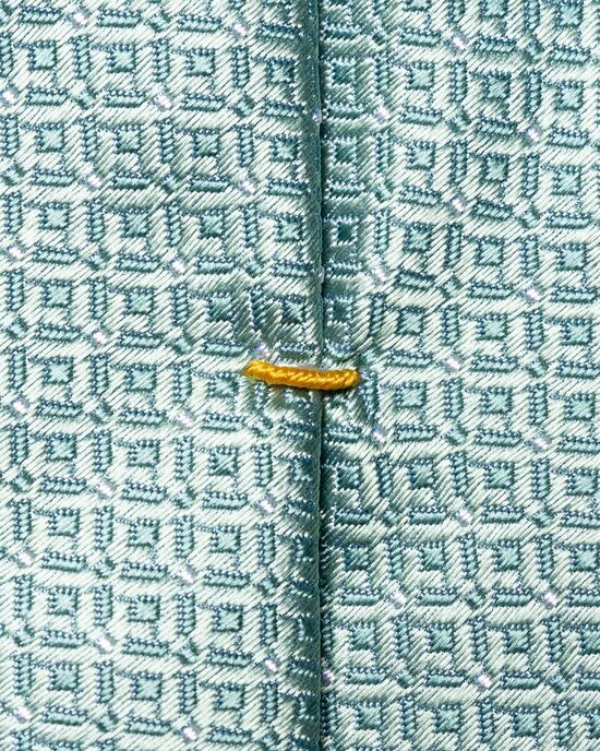 Hellgrne Krawatte aus gewebter Seide mit geometrischem Muster