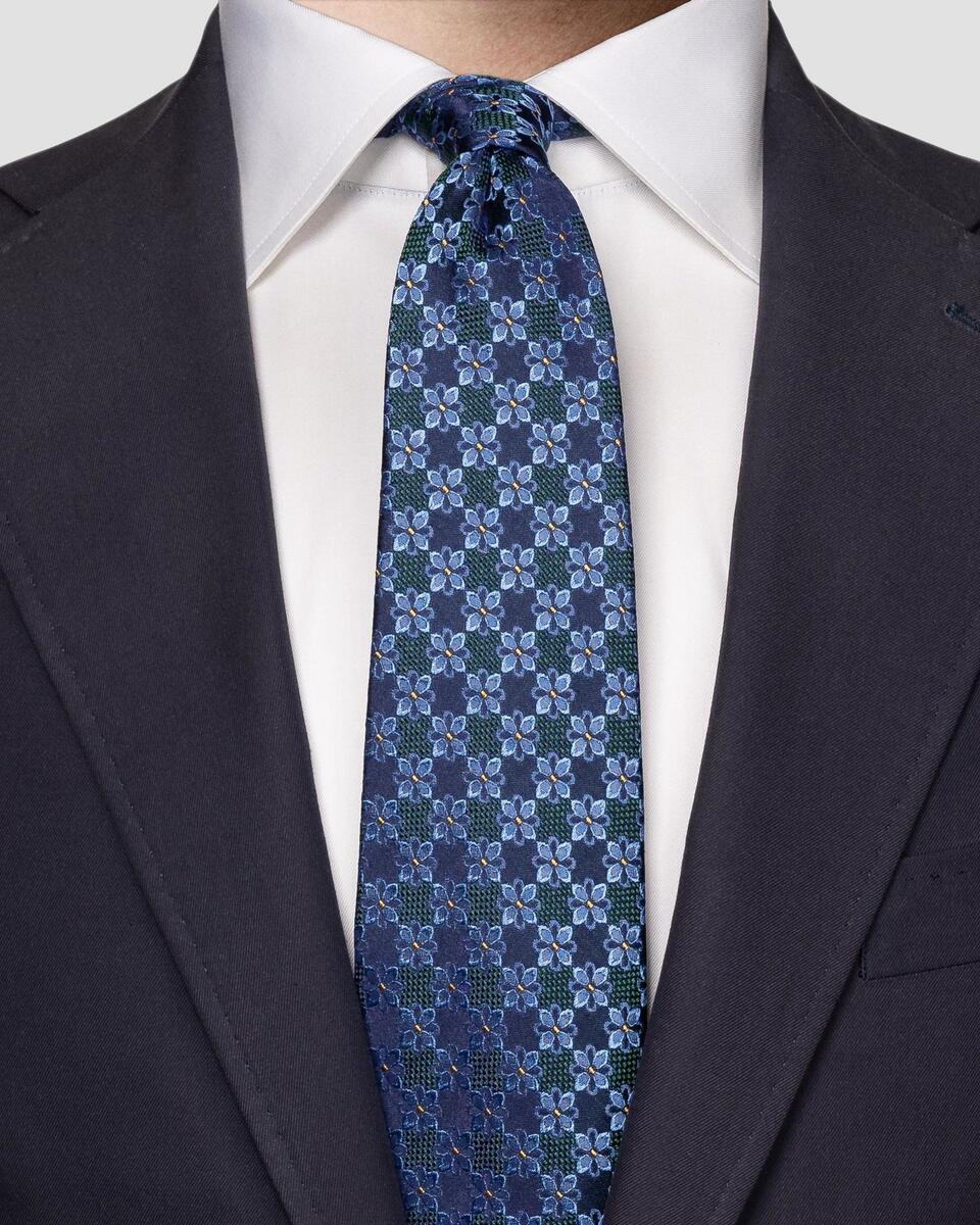 Dunkelgrne Krawatte mit floralem Muster aus gewebter Seide