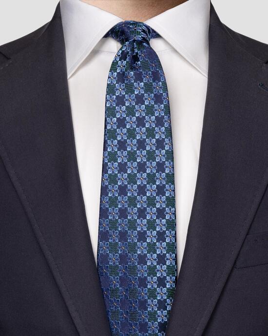 Dunkelgrne Krawatte mit floralem Muster aus gewebter Seide